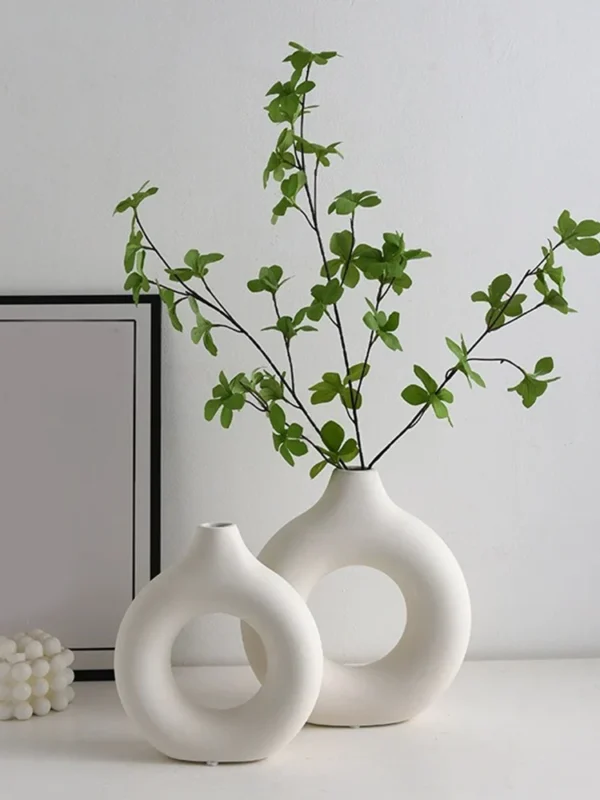 Hollow circular Nordic vase for flowers, ideal for home decoration, living room, office, or as a gift.